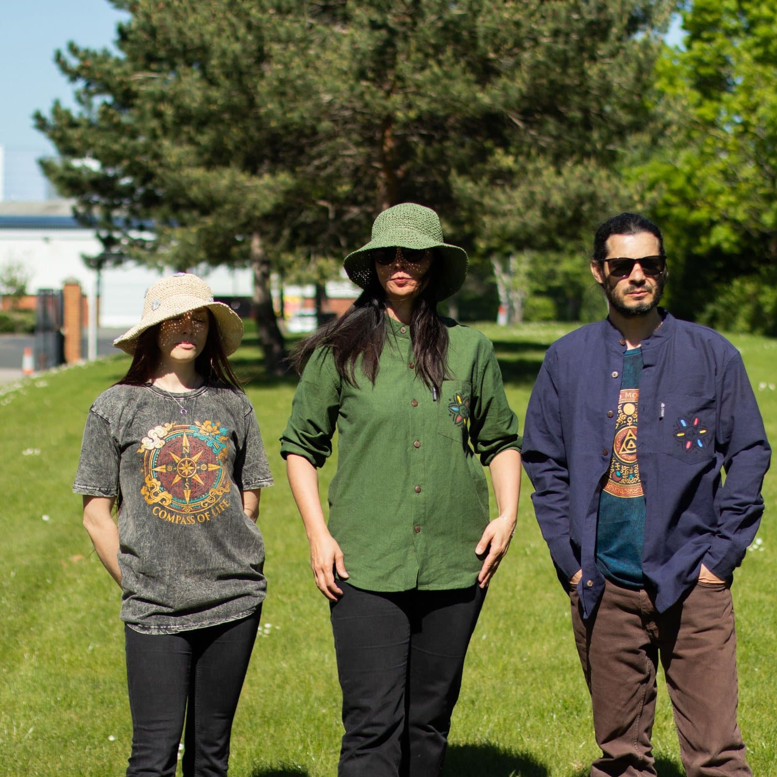 Forest green collarless Kathmandu shirt with a hand-painted pocket