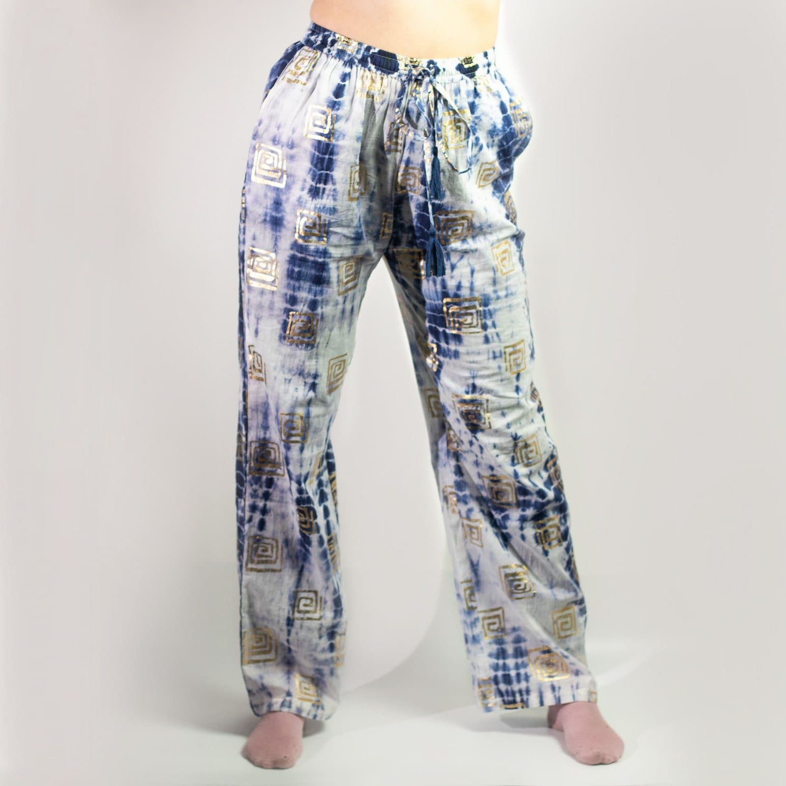Blue tie-dye lounge pants with a repeating gold Greek motif