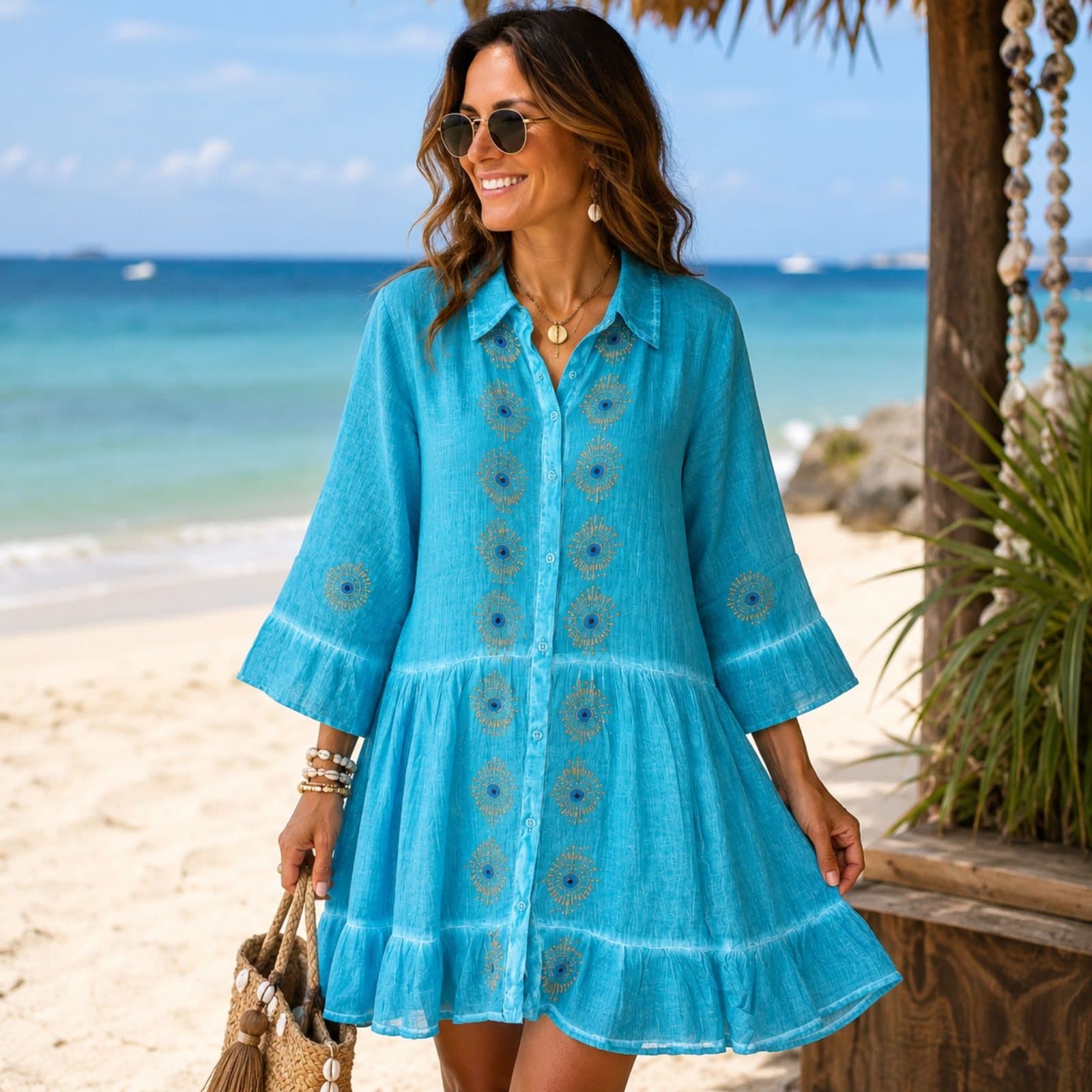 Turquoise tunic dress with gold and blue evil eye block print