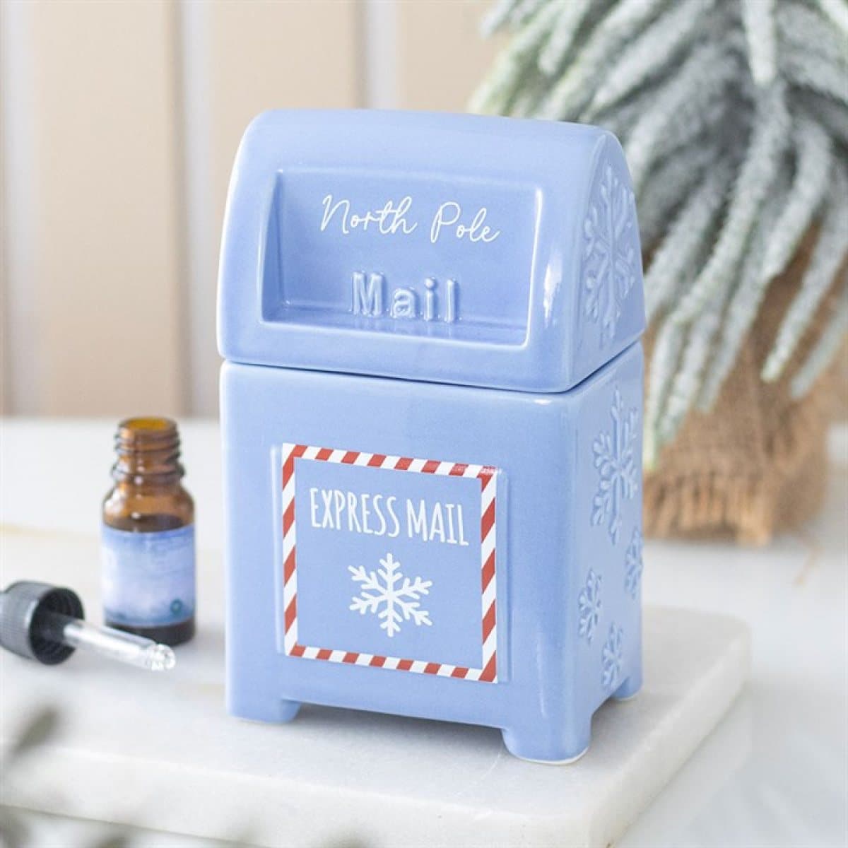 Blue ceramic North Pole postbox oil burner with snowy cut-outs