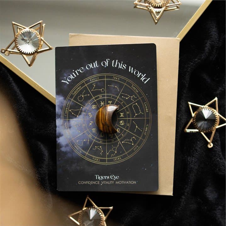 Tiger's Eye crescent moon crystal greeting card with an astrology wheel design