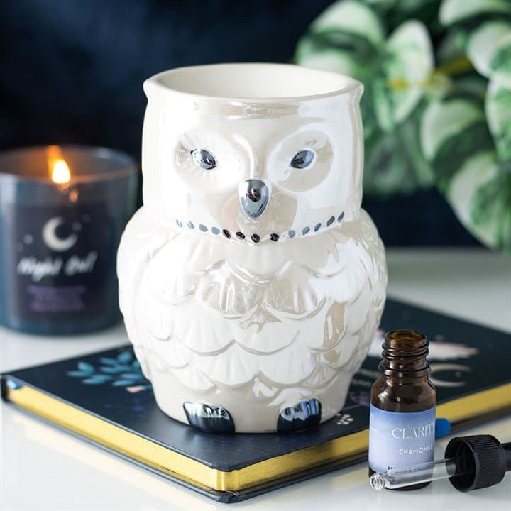 Ceramic owl shaped oil burner with an iridescent glaze