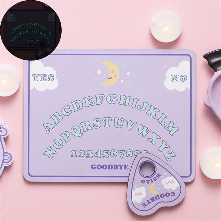 Pastel talking board with glow in the dark details and a matching planchette