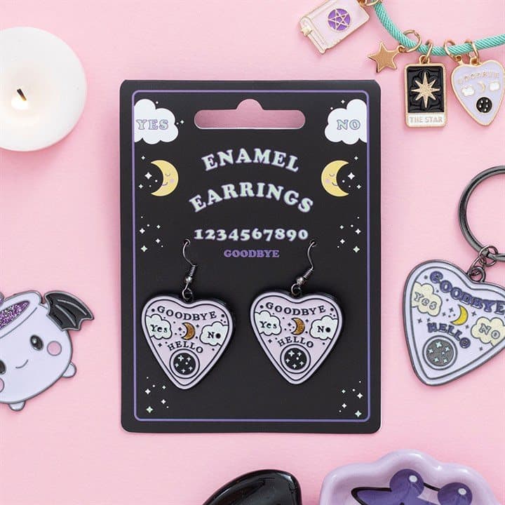 Pastel talking board planchette earrings on a cardboard back with a euro hook