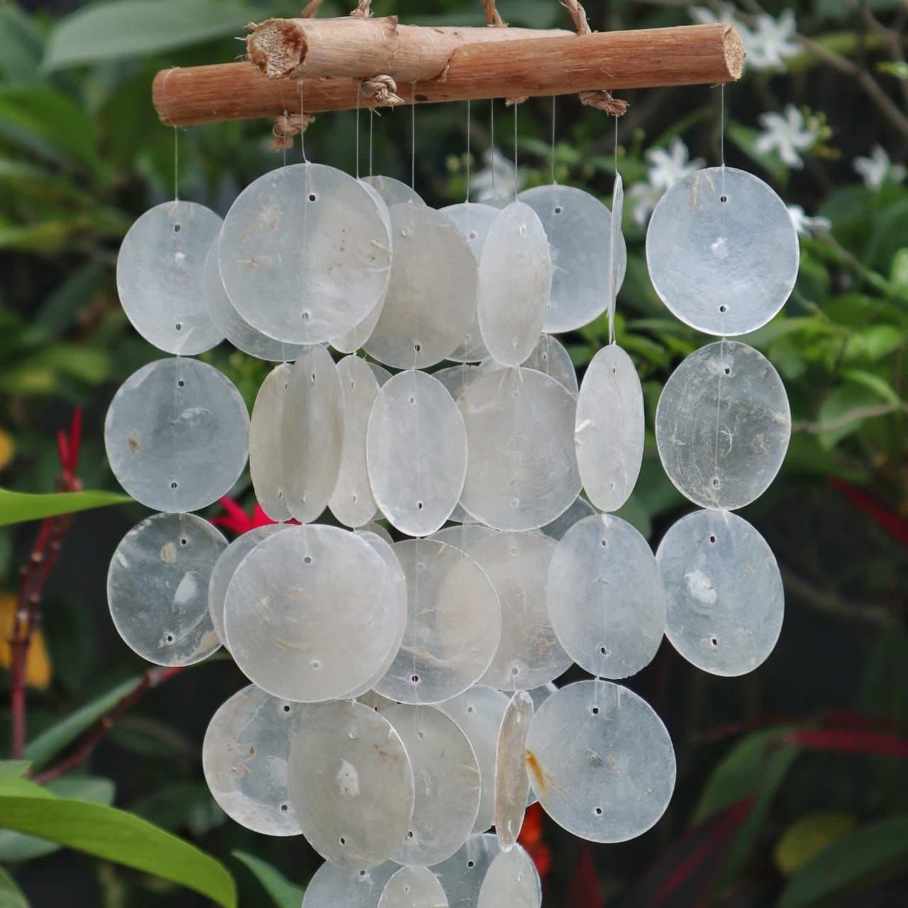 Driftwood and Capiz cross wind chime hanging