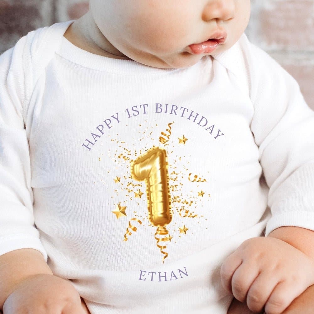 Personalised 1st birthday babygrow with a gold balloon design