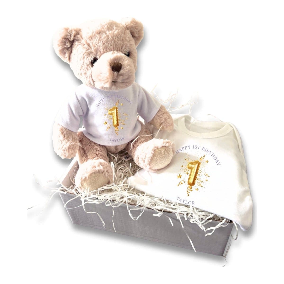 Personalised 1st birthday gift box with a teddy and a baby vest with a gold balloon design