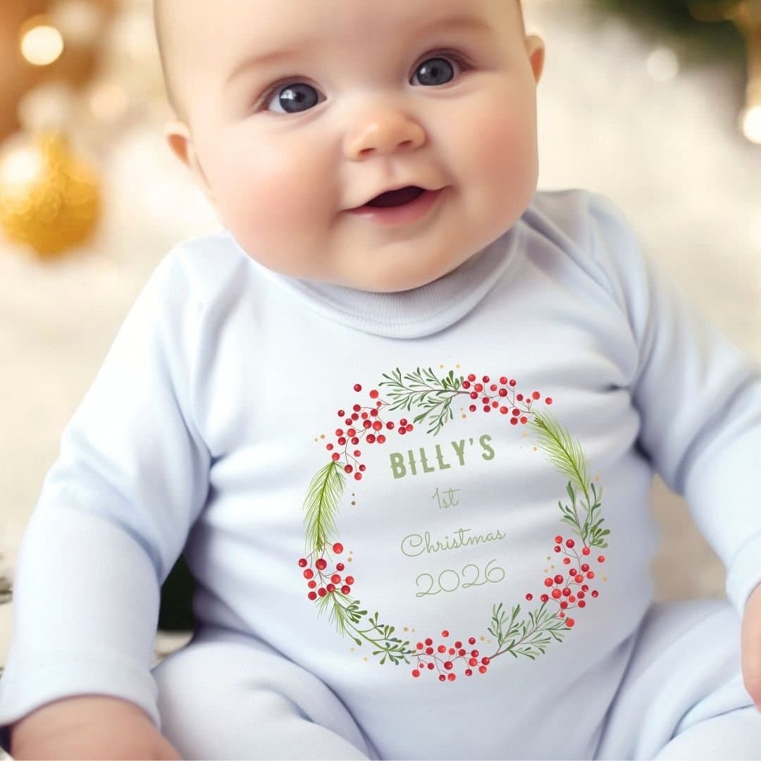 Baby vest with a festive berry wreath 1st Christmas design and a personalised name