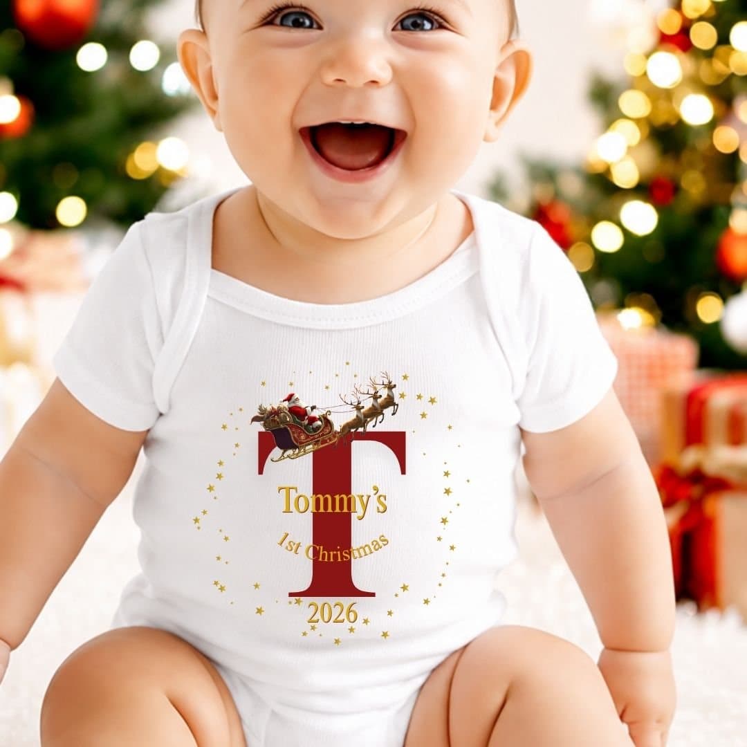 Personalised baby vest and teddy bear with a Santa sleigh design and a name