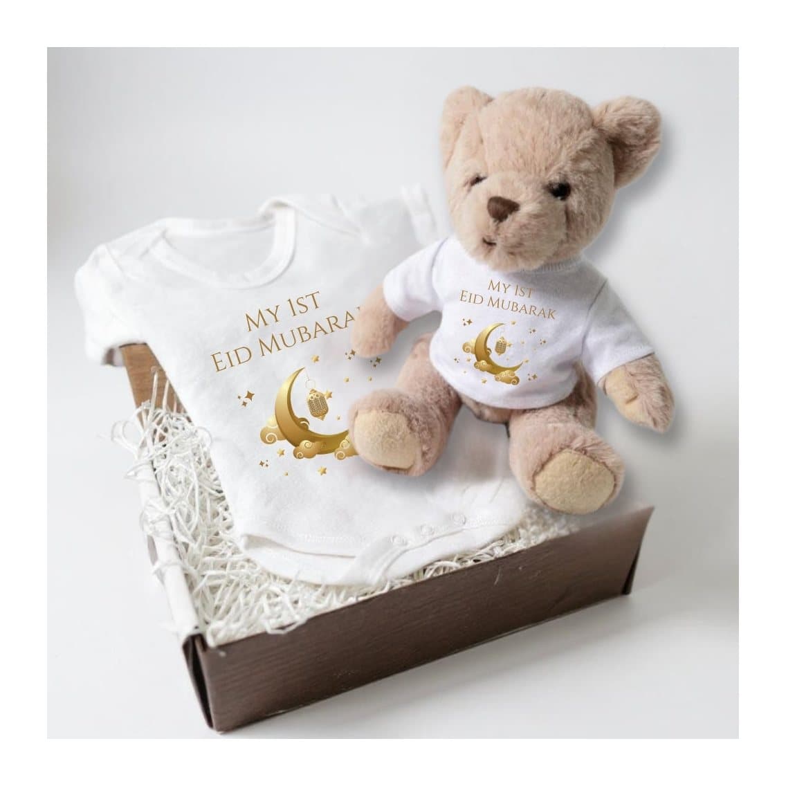 Personalised 1st Eid Mubarak baby gift box with a teddy bear and a baby vest