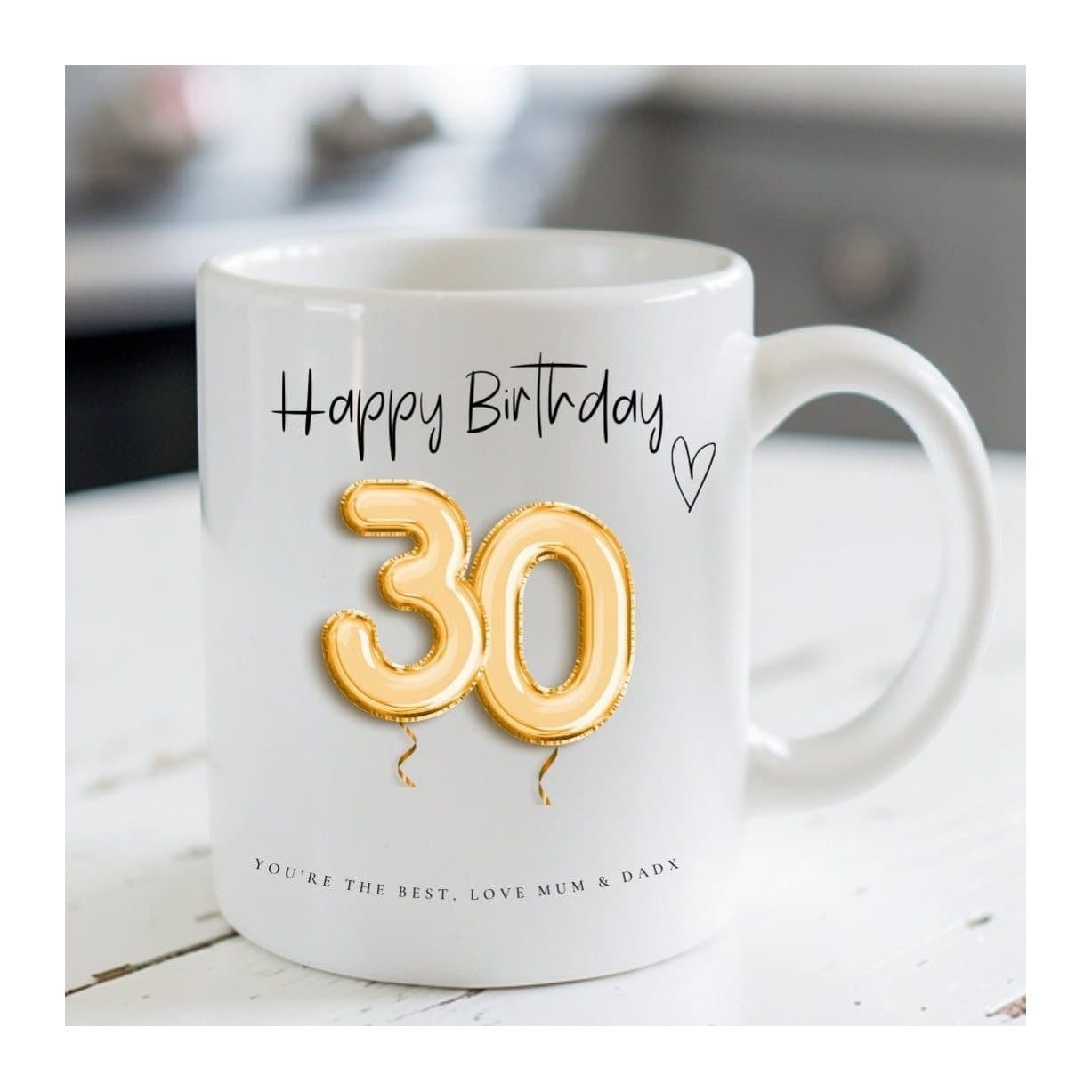 Personalised 30th birthday mug with a gold balloons design on a white background