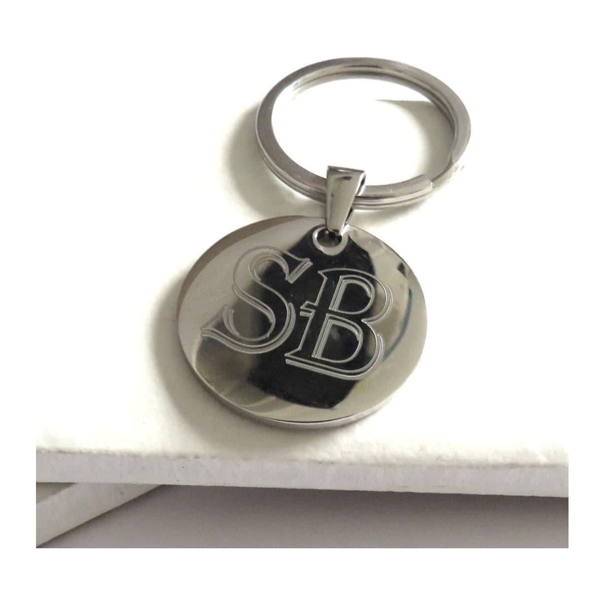 Round polished stainless steel keyring with personalised engraved letters or numbers