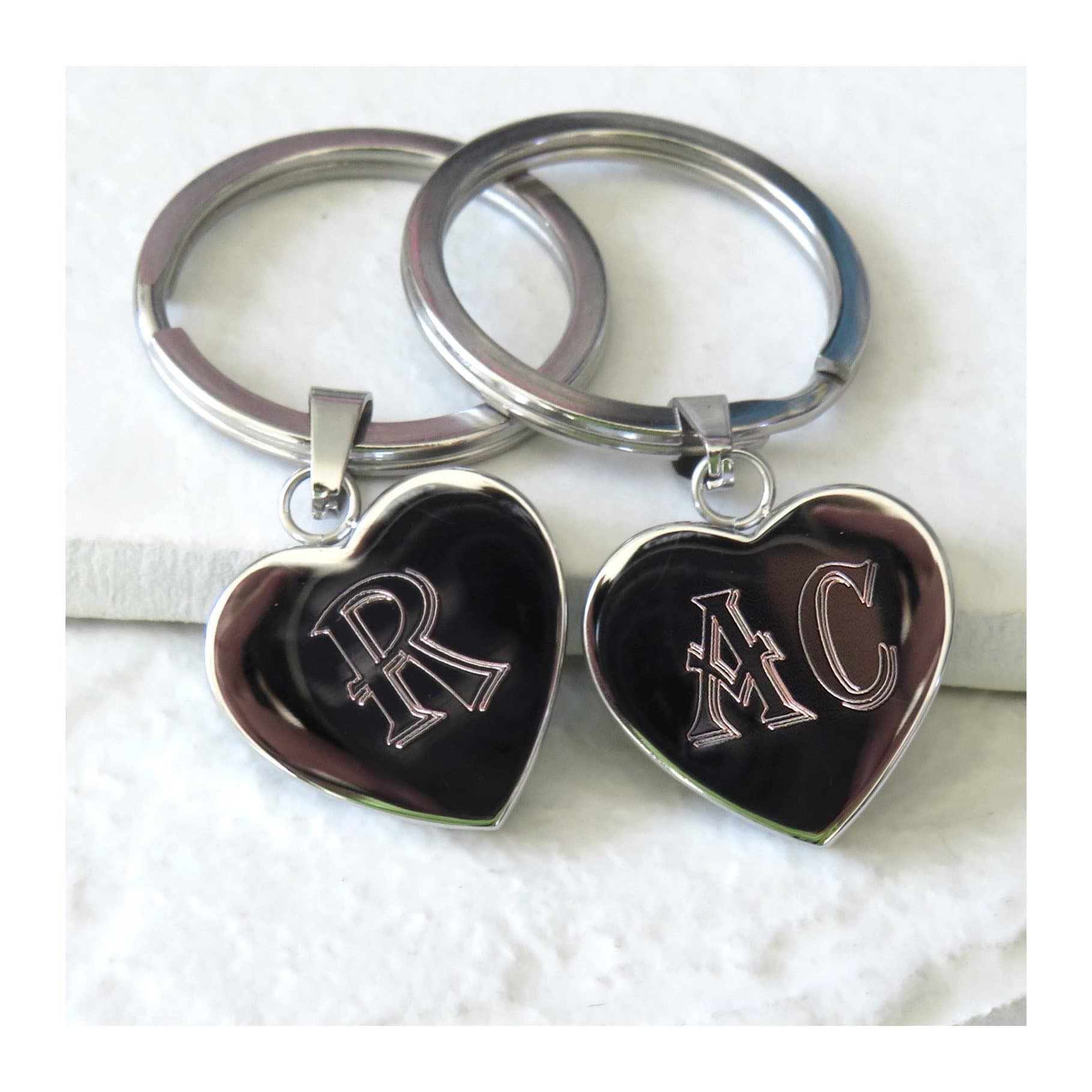 Polished stainless steel heart keyring with engraved initials