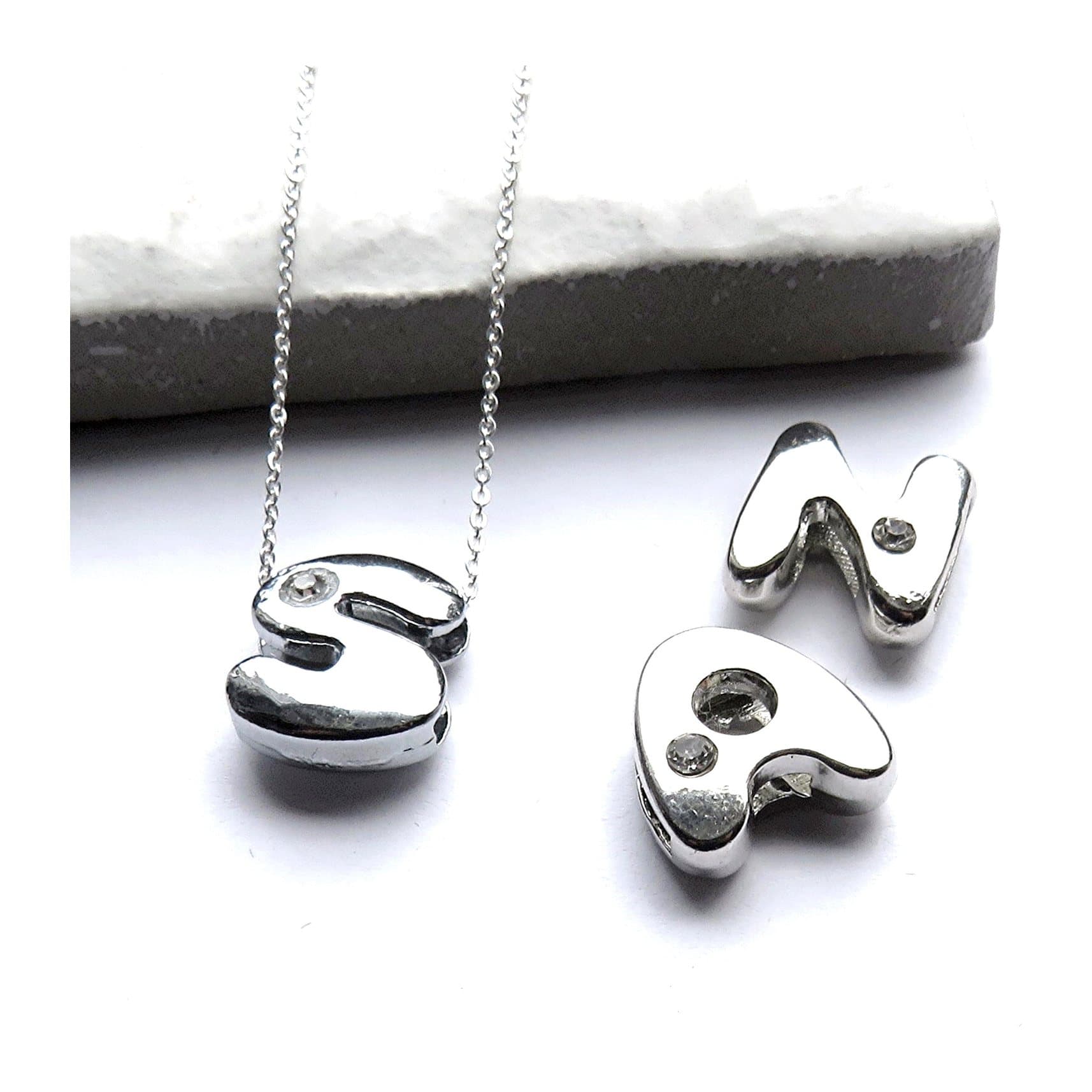 Silver alphabet initial necklace with a small diamante letter on a silver chain