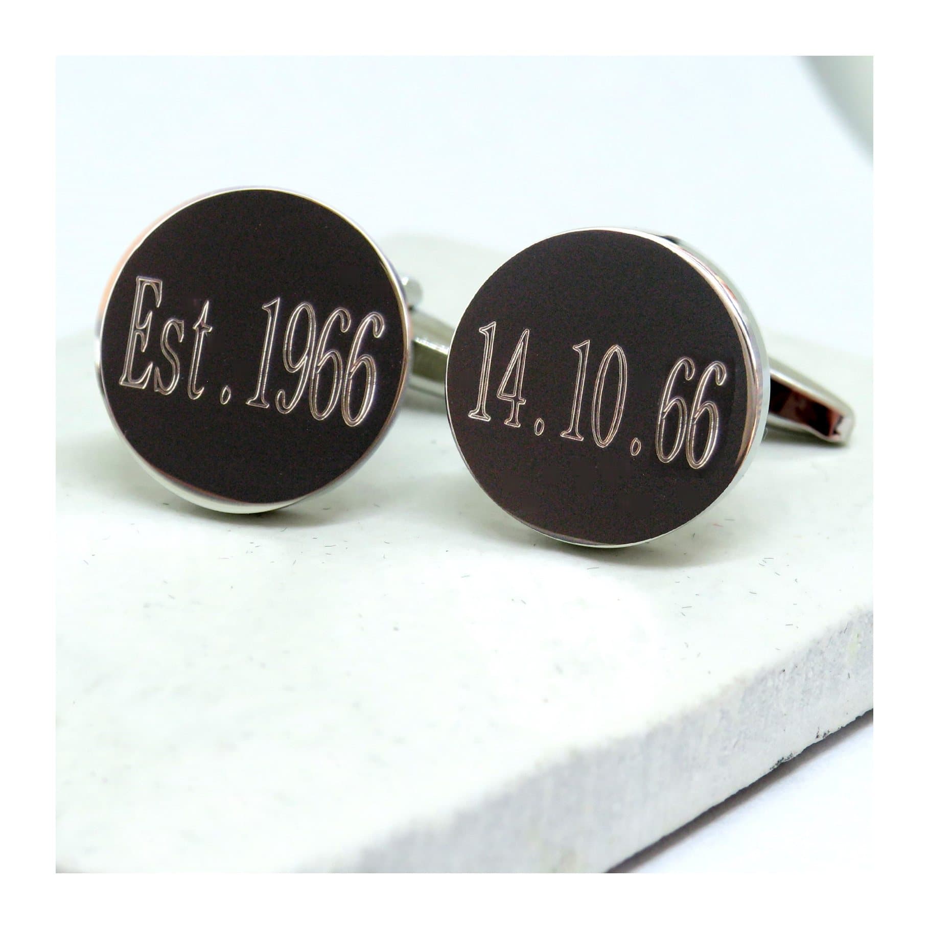 Personalised round silver-coloured cufflinks, engraved with a name