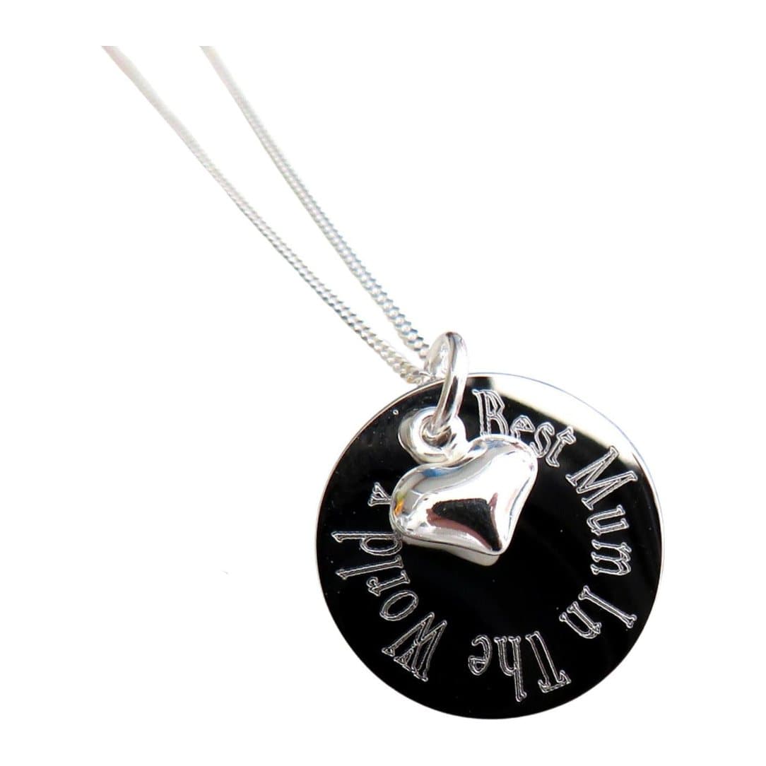 Silver heart charm necklace with an engraved round disc reading Best Mum In The World