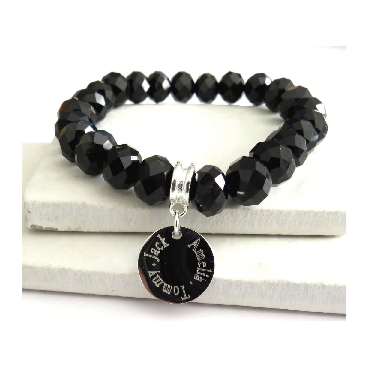 Personalised black crystal beaded bracelet with a silver round charm
