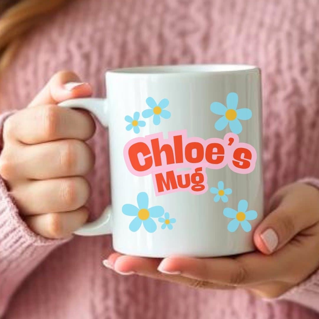 Blue daisy ceramic mug with a personalised name design