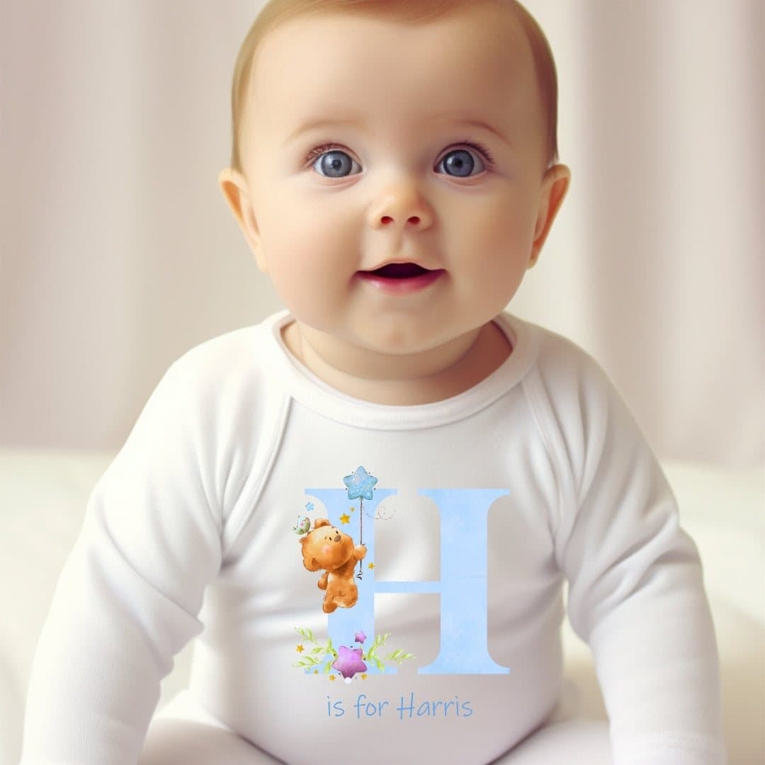 Blue teddy initial baby grow, vest or bib with a name
