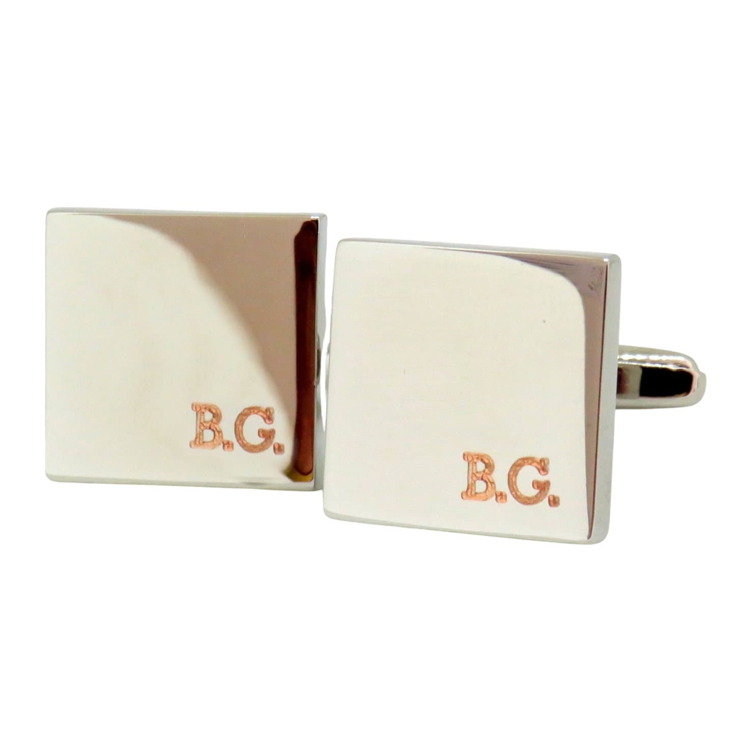 Square silver coloured cufflinks with engraved initials