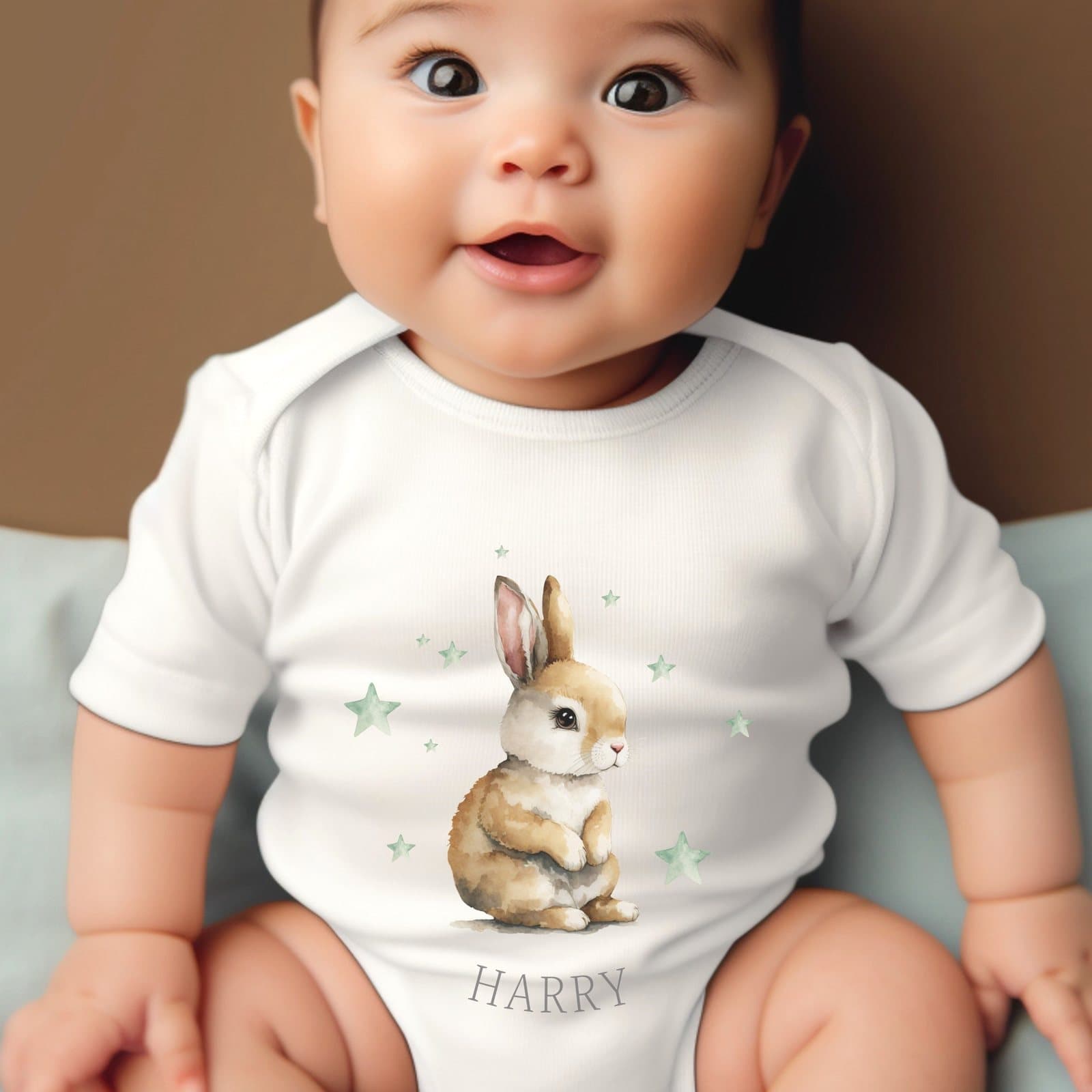 Personalised bunny baby grow with green stars and a name print