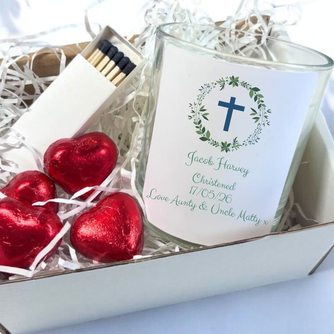 Personalised christening candle with a cross and wreath design