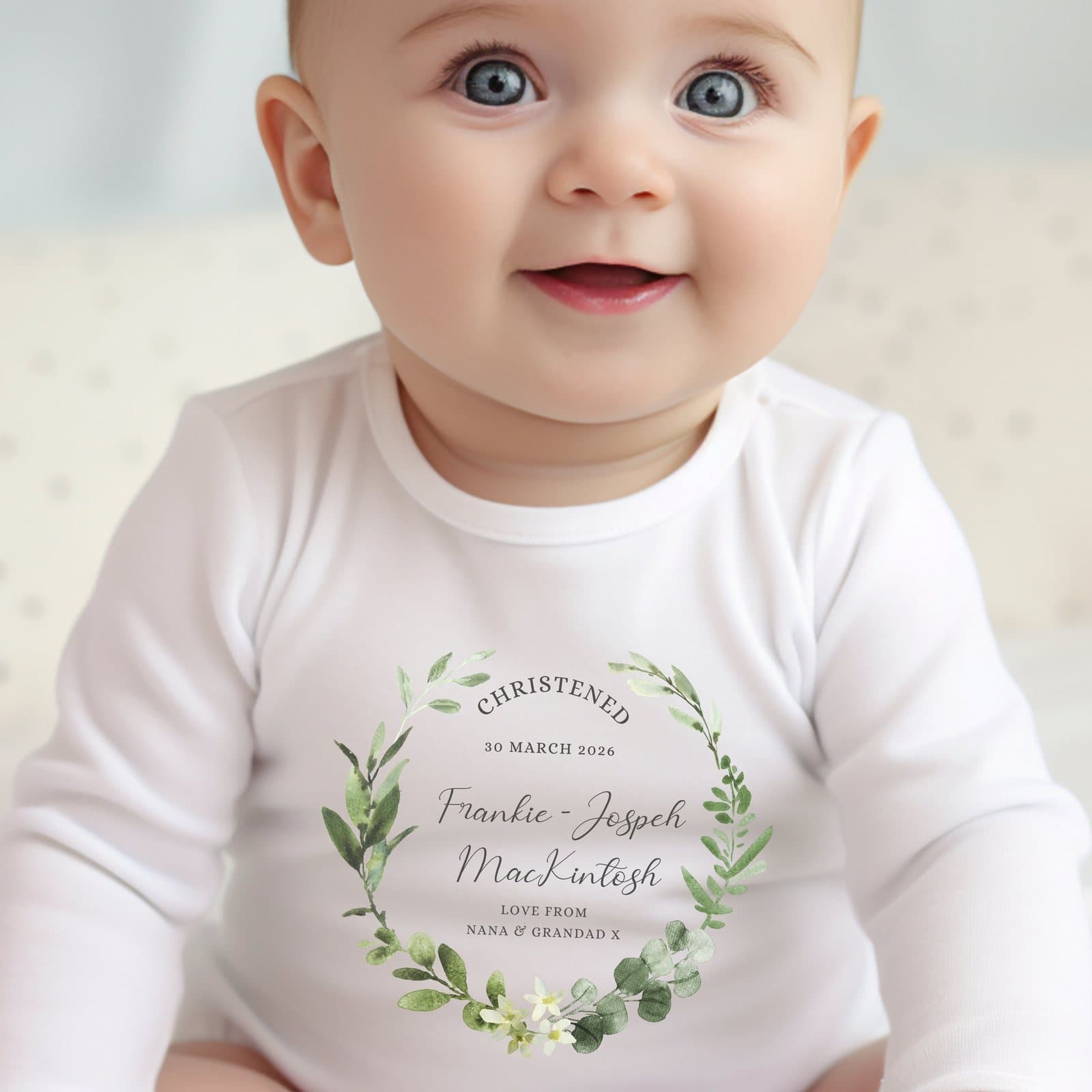 Personalised green floral christening babygrow, vest or bib with name