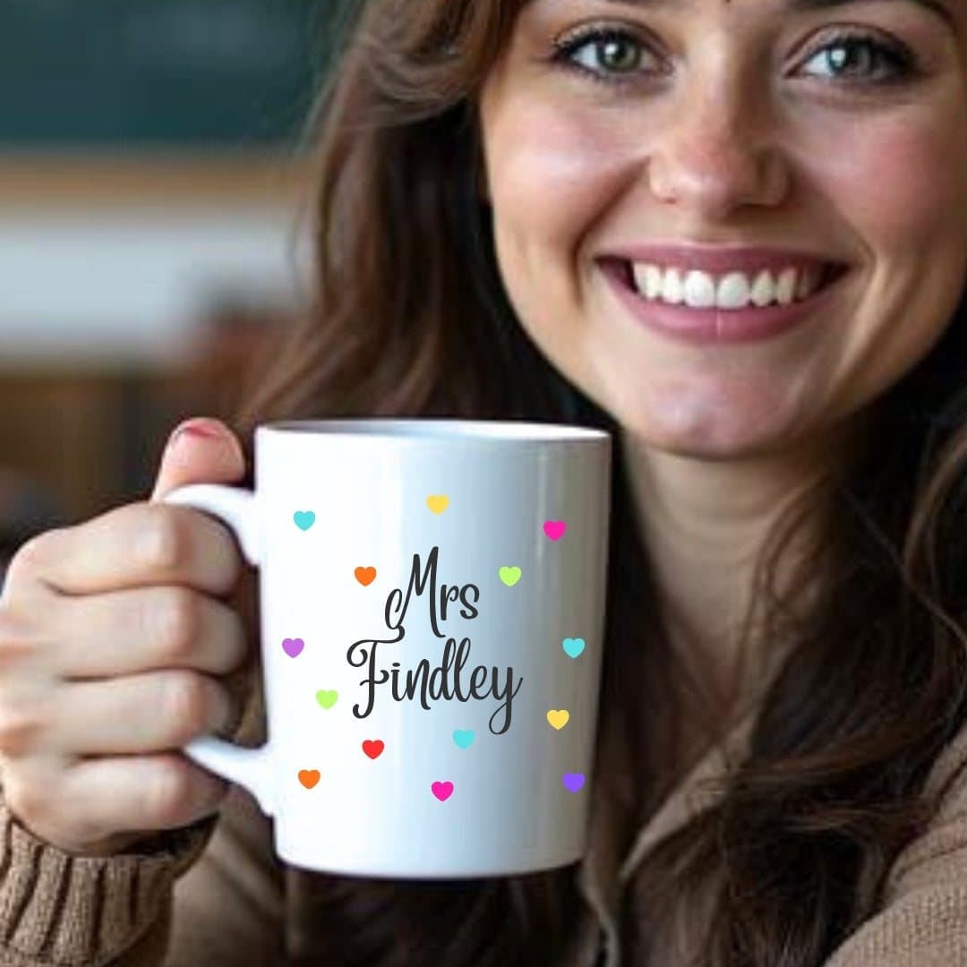 Personalised colourful hearts ceramic mug with bright hearts printed on both sides.