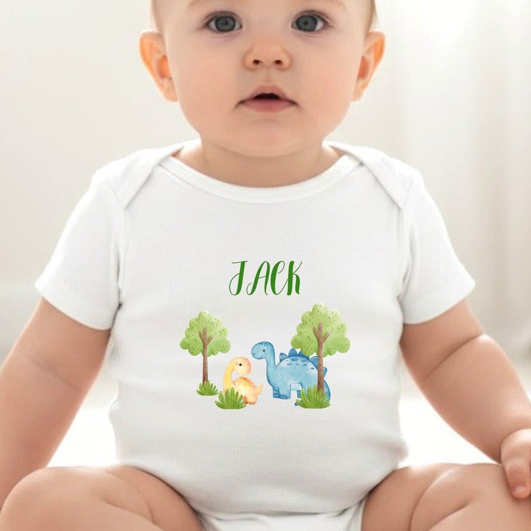 Personalised dinosaur baby outfit with a name printed on it