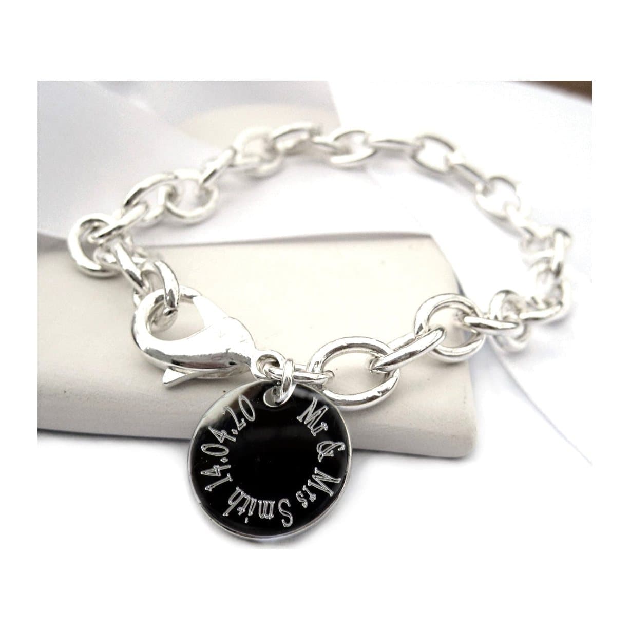 Personalised silver plated cable bracelet with a round engraved disc