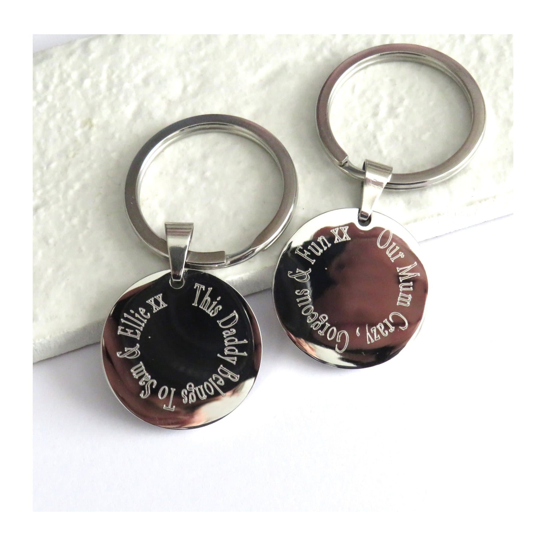 Personalised round stainless steel keyring with engraved text
