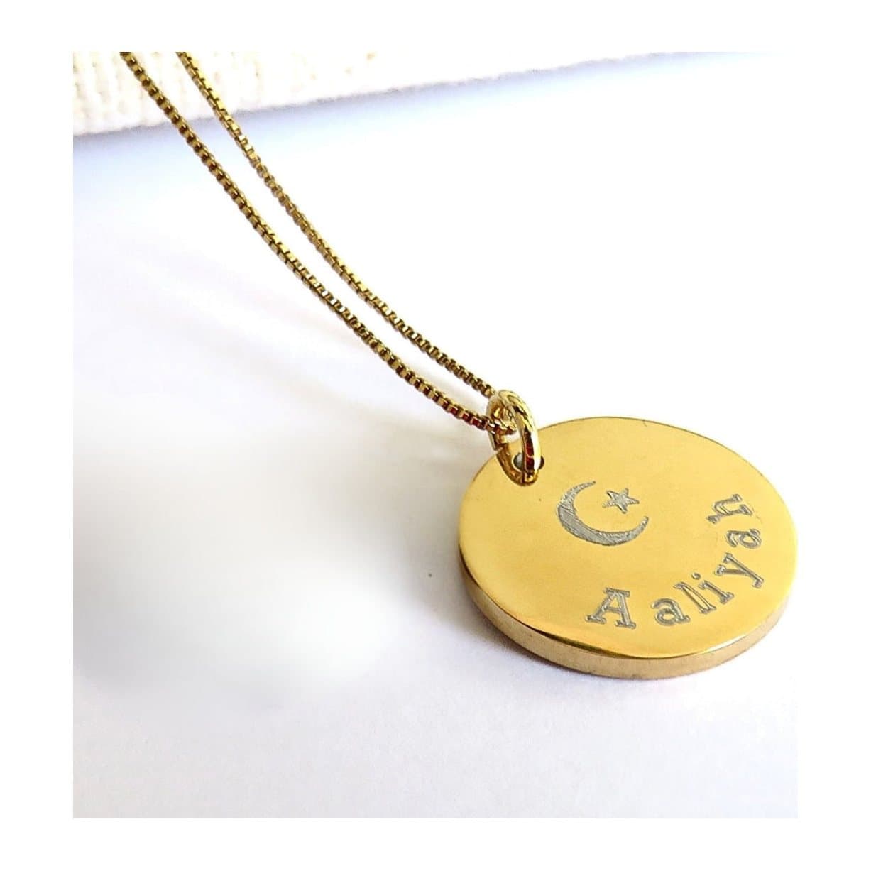 Gold plated Eid Mubarak necklace with a crescent moon and star disc