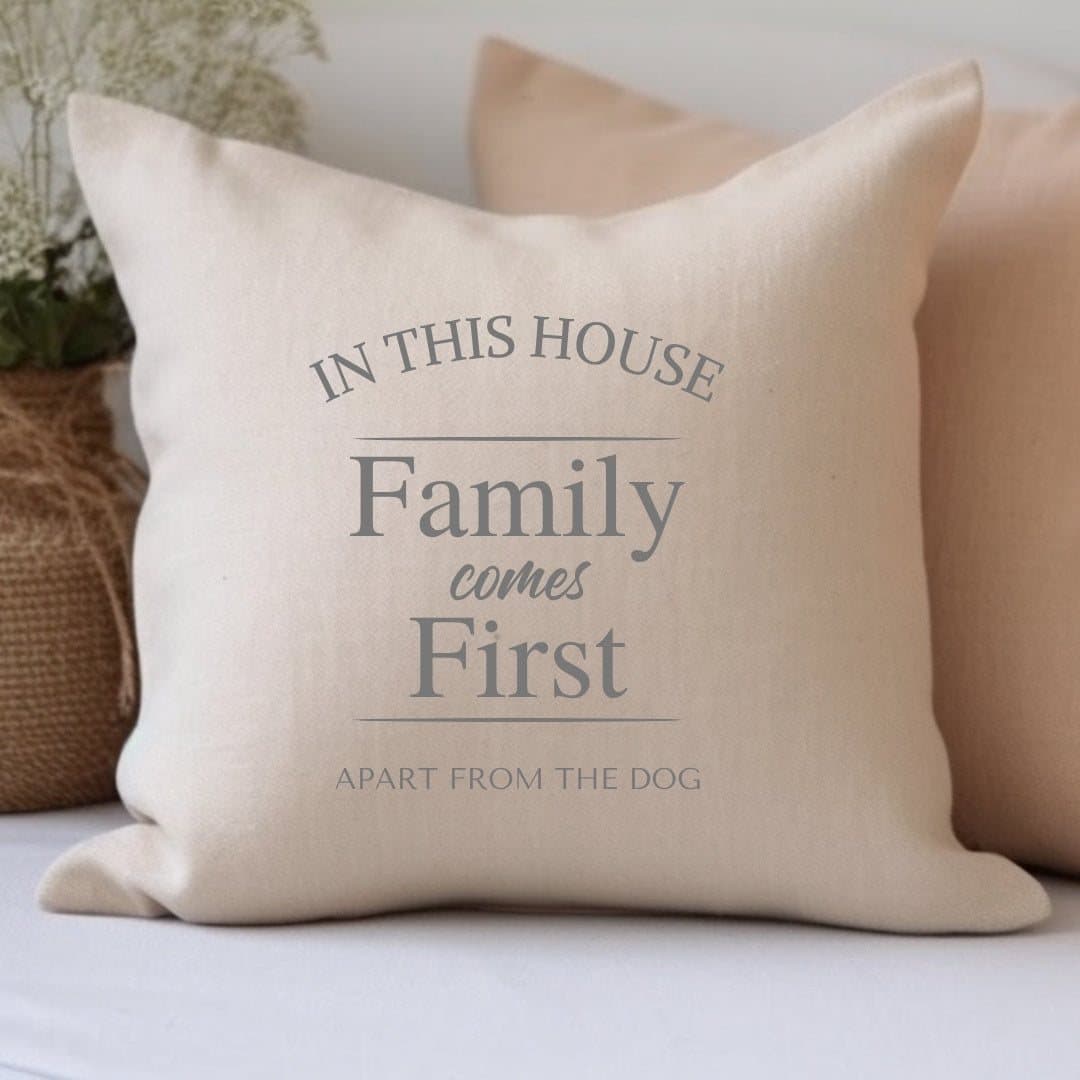 Cream personalised cushion reading IN THIS HOUSE Family comes First
