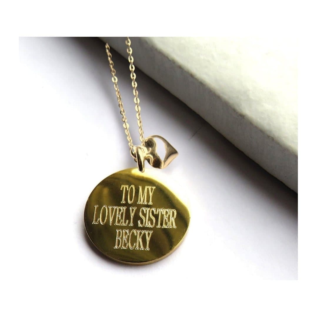 Personalised gold disc necklace with a mini heart charm on a fine gold chain