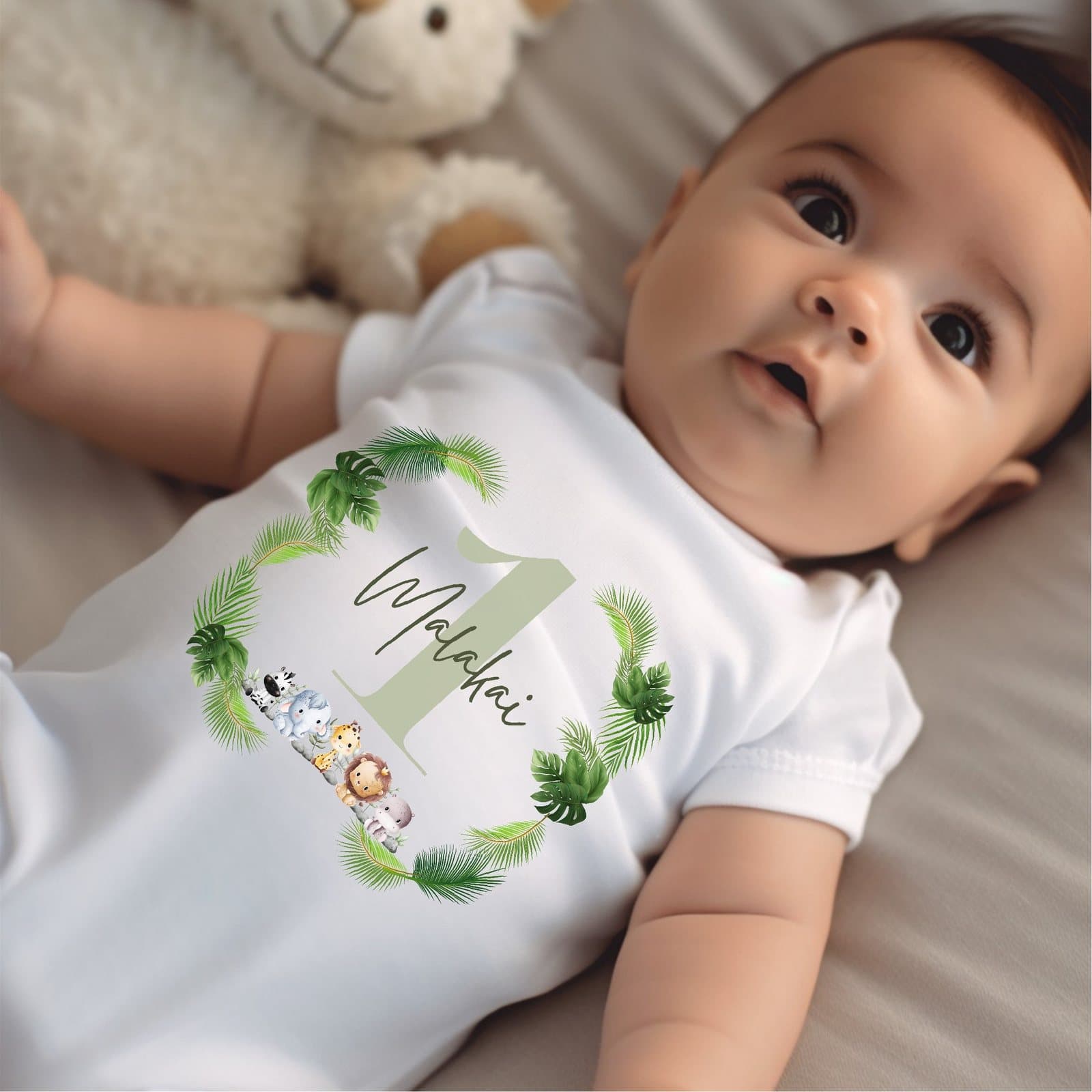Personalised green baby grow with a safari jungle animals design