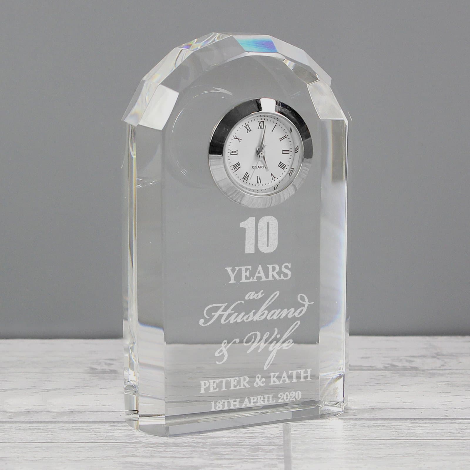 Crystal anniversary clock personalised with years as husband and wife
