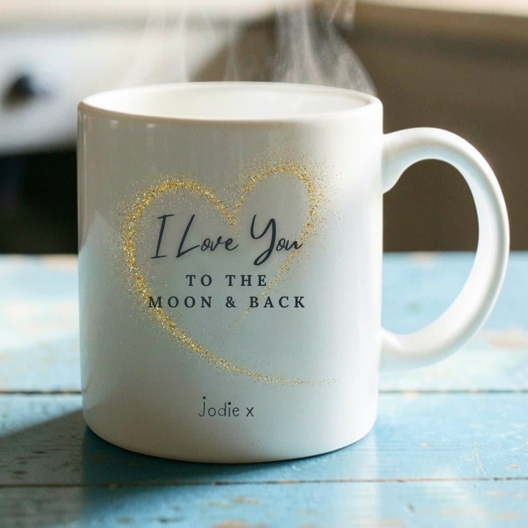Personalised Love You to the Moon and Back ceramic mug with the design printed on it