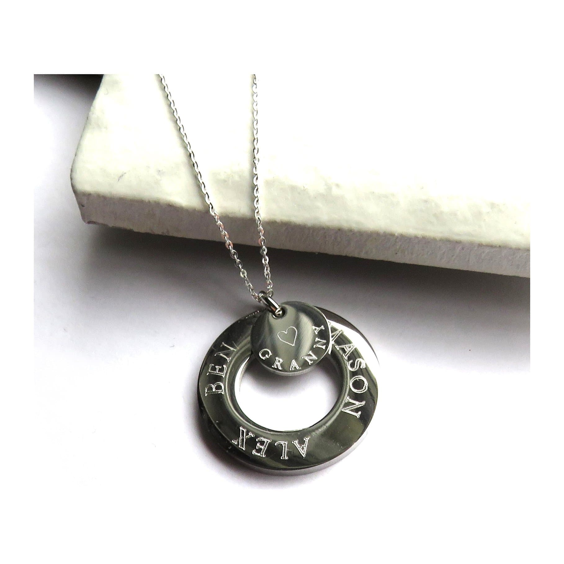 Personalised infinity and mini disc necklace with a silver disc on a silver chain