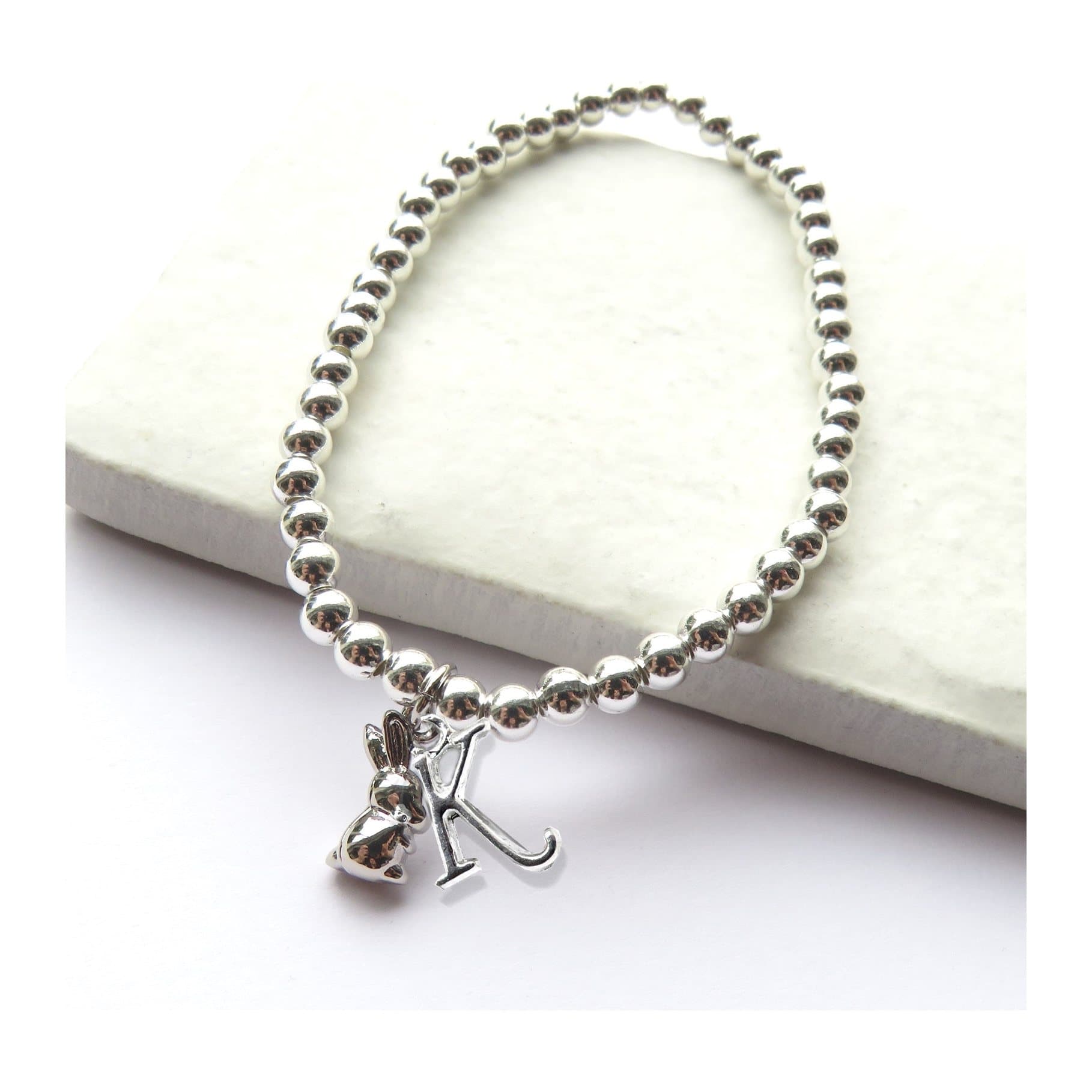 Personalised initial bunny rabbit charm on a stretch beaded bracelet