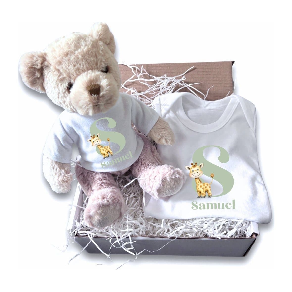Personalised baby gift box with a little giraffe design on a teddy bear and a baby vest