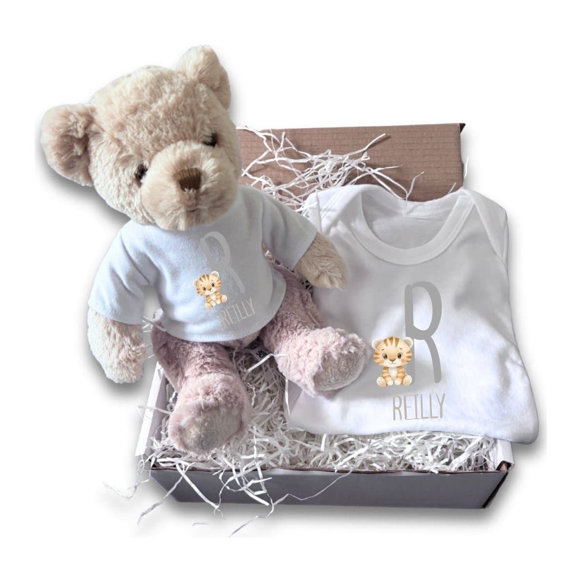 Personalised Little Tiger baby gift box with a teddy bear and a baby vest.