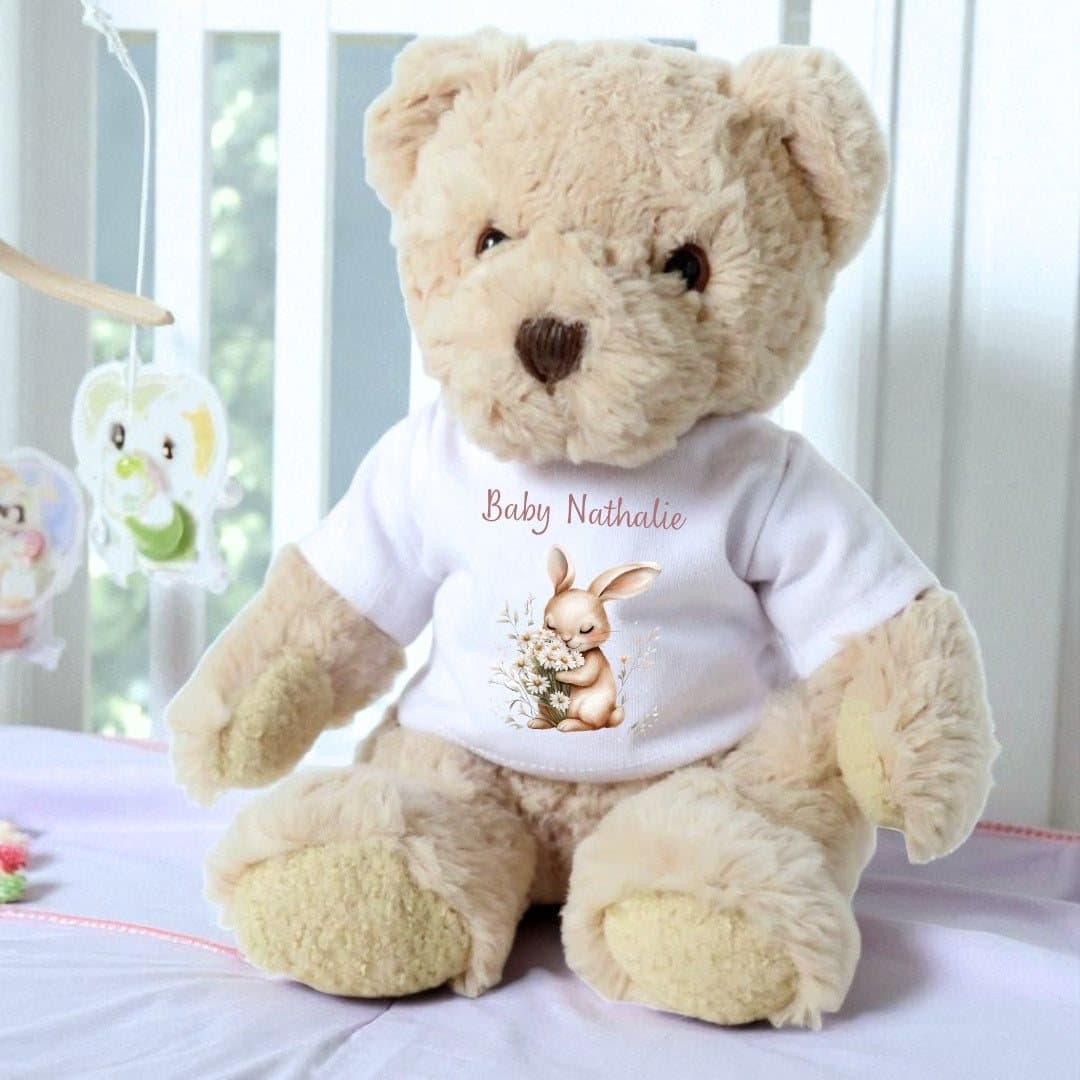 Personalised teddy bear in a T-shirt with a bunny holding daisies