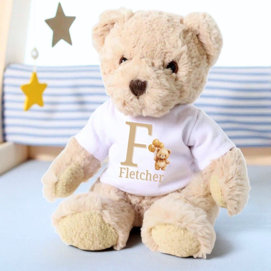 Personalised teddy bear in a T-shirt with a golden teddy bear holding balloons