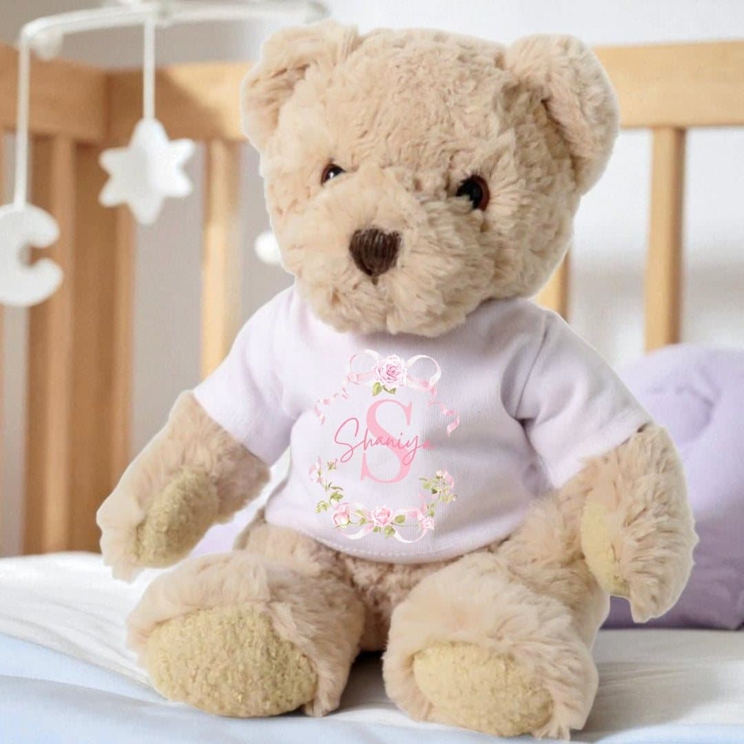 Personalised teddy bear in a printed T-shirt with pink roses