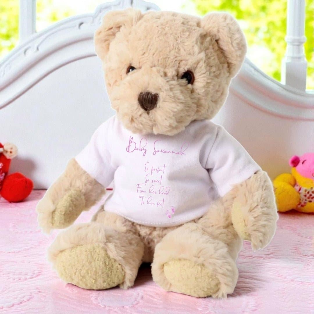 Teddy bear in a printed T-shirt with So Perfect So Sweet wording and baby footprints
