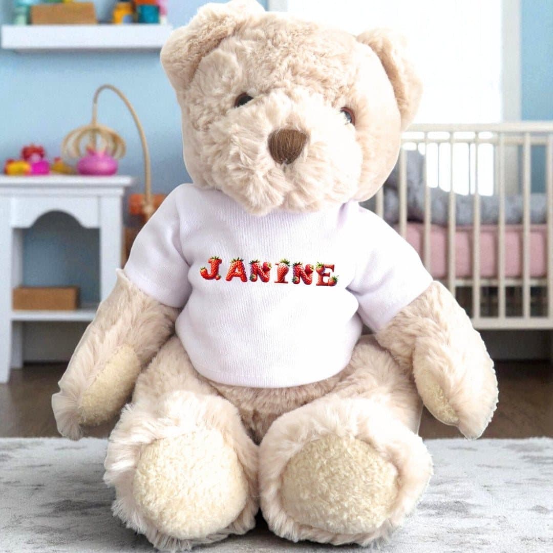 Personalised teddy bear dressed in a T-shirt with a strawberry-themed design