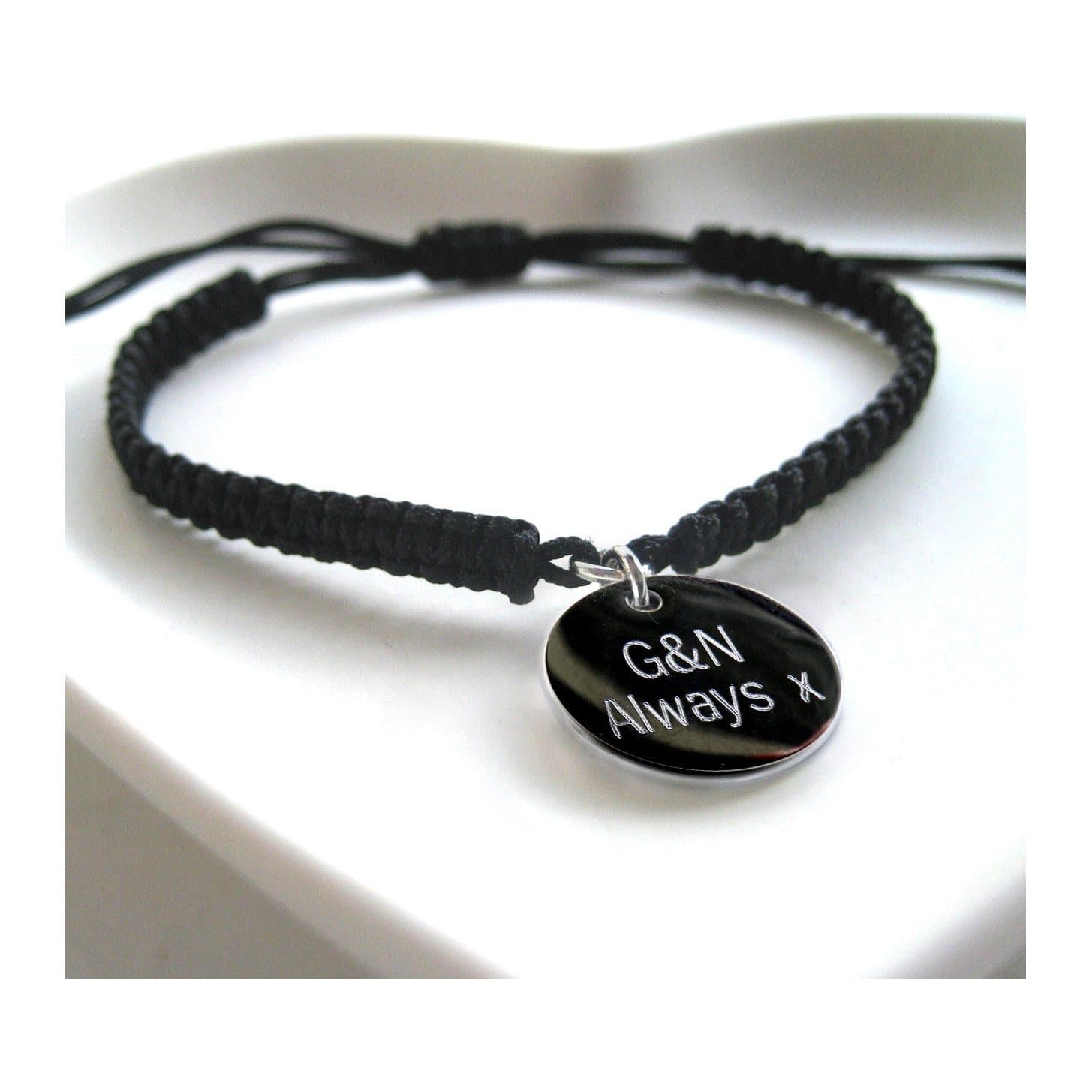 Braided nylon friendship bracelet with a stainless steel disc