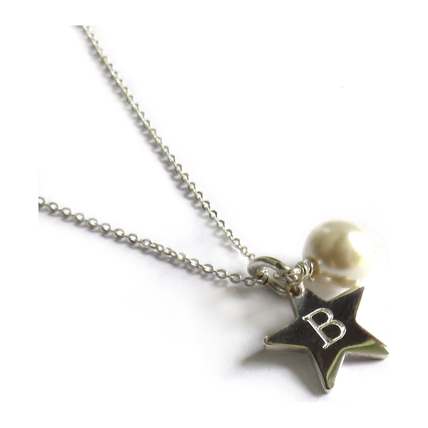 Personalised mini silver star and pearl necklace with an ivory pearl and an engraved star