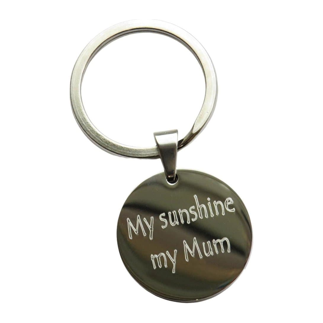 Round personalised stainless steel keyring with an engraved message.