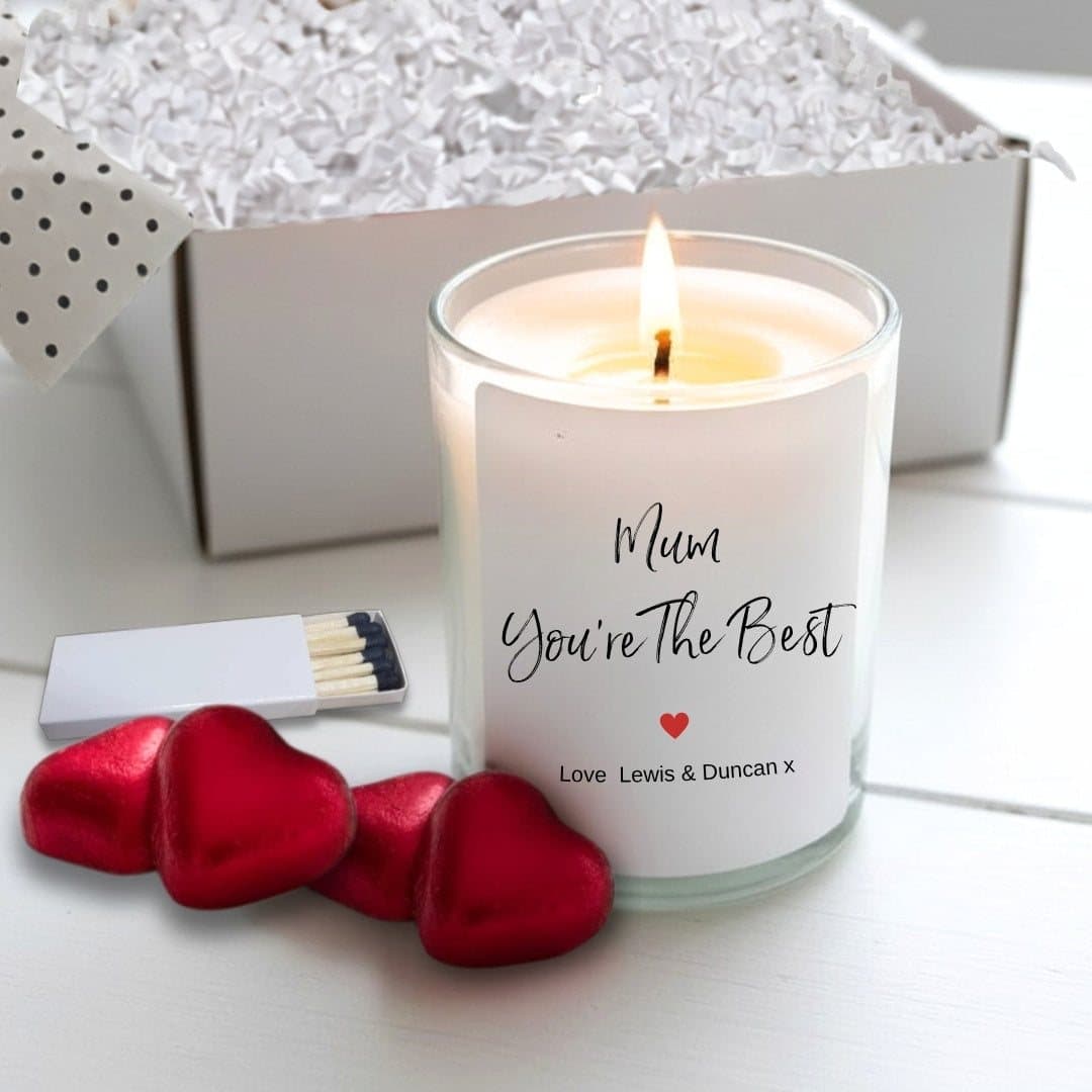 Personalised candle with red heart design, four chocolate hearts and matches